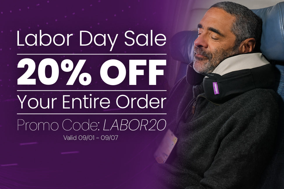 Promotional graphic for a Labor Day sale with large white text reading '20% OFF Your Entire Order' and promo code 'LABOR20' on a purple background, alongside a man resting in a dark gray neck pillow.